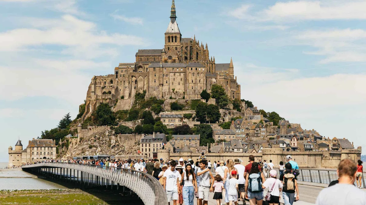 Coach and abbey ticket, your pace on a Normandy tour from Paris, France