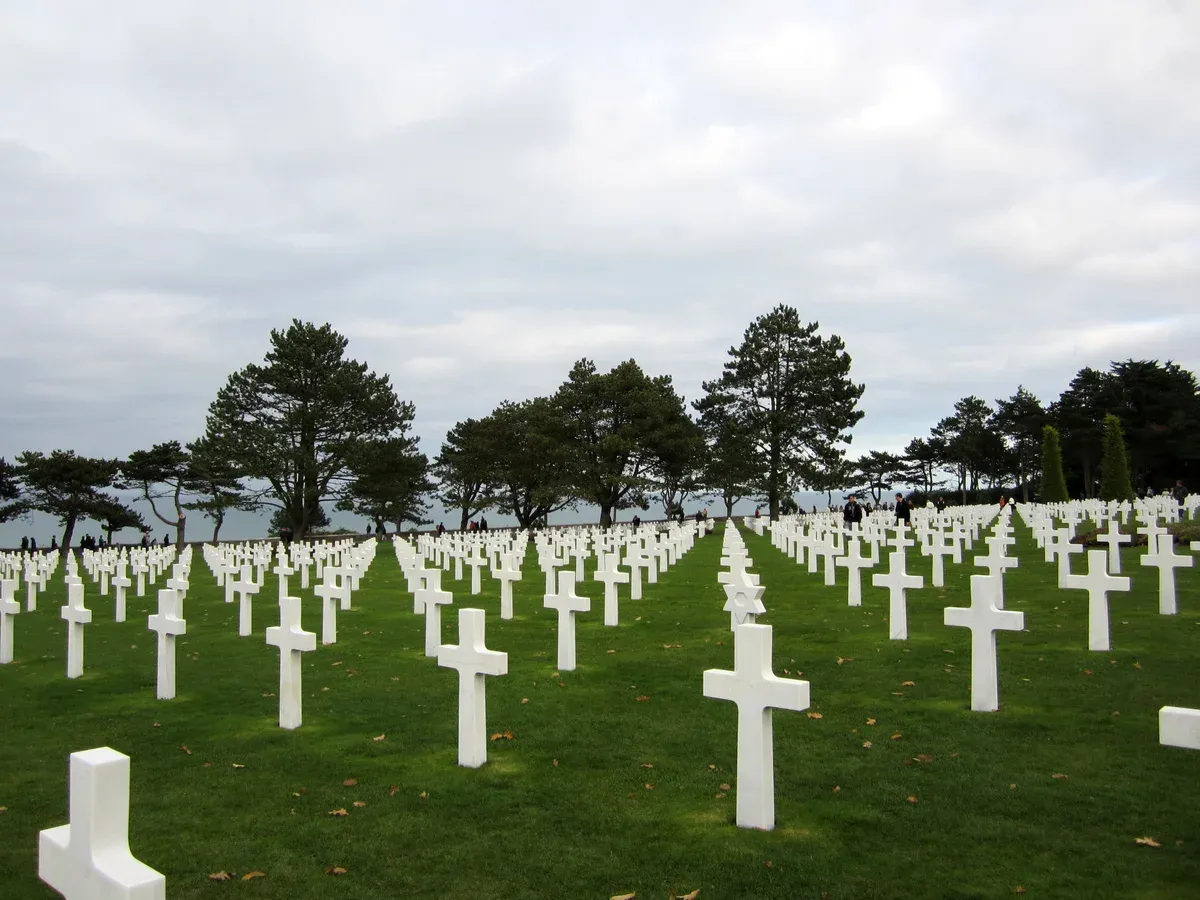 Rows of white headstones at the Normandy American Cemetery, the last stop on Normandy tours from Paris